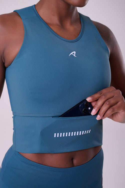 GRIT BOSSA CROP TOP WITH LARGE FRONT POCKET
