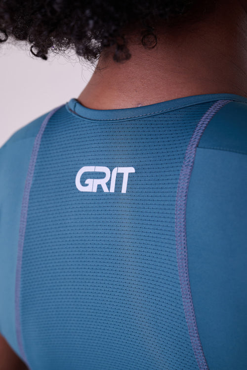 GRIT BOSSA CROP TOP WITH LARGE FRONT POCKET