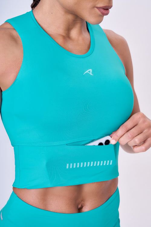 GRIT BOSSA CROP TOP WITH LARGE FRONT POCKET