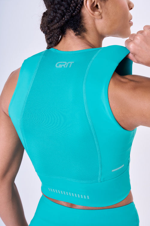 GRIT BOSSA CROP TOP WITH LARGE FRONT POCKET