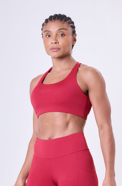 ESSENTIAL RUN STAMINA RACERBACK SPORTS BRA