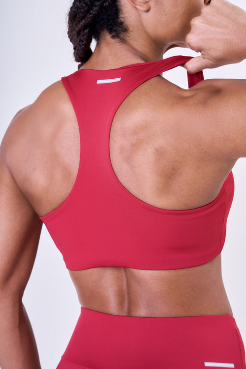 ESSENTIAL RUN STAMINA RACERBACK SPORTS BRA