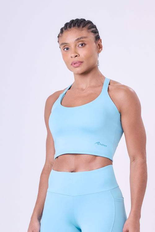 ESSENTIAL RUN LENGTHY CROPPED SPORTS BRA
