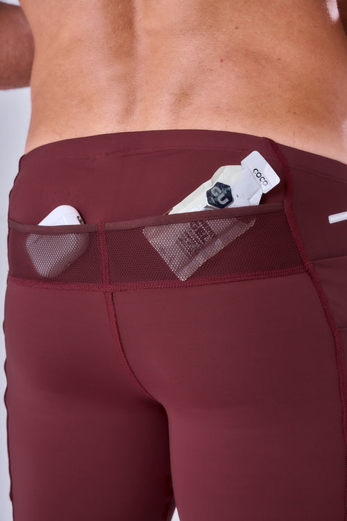 GRIT BOSSA 6-POCKET 9" COMPRESSION SHORTS