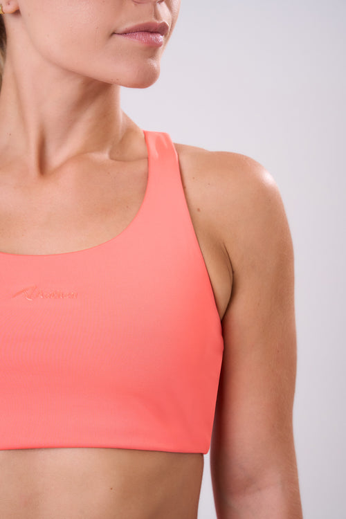 ESSENTIAL RUN STAMINA RACERBACK SPORTS BRA