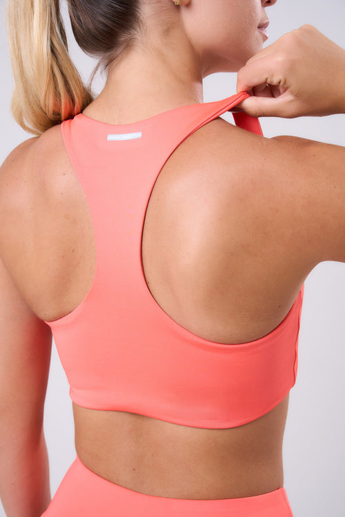 ESSENTIAL RUN STAMINA RACERBACK SPORTS BRA