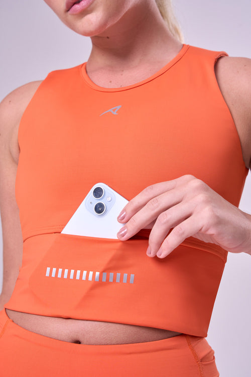GRIT BOSSA CROP TOP WITH LARGE FRONT POCKET