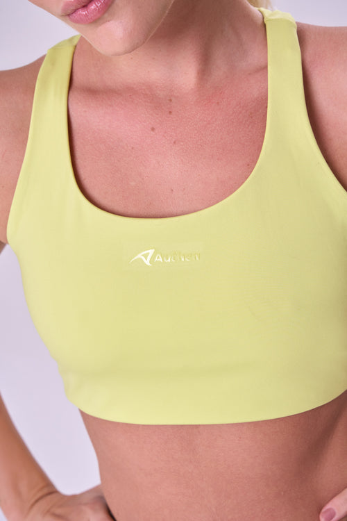 ESSENTIAL RUN STAMINA RACERBACK SPORTS BRA